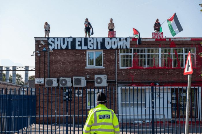 Five Palestine Action activists on the roof of UAV Engines Ltd, Elbit's subsidiary in Shenstone.