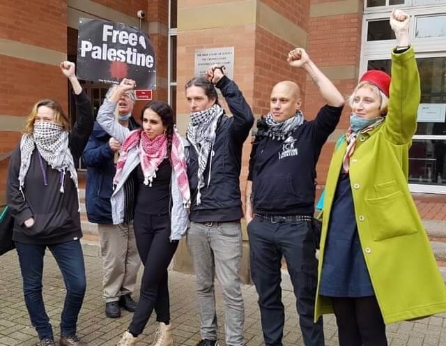 Five Palestine Action activists leaving Stafford Crown Court after pleading not guilty to charges of criminal damage, relating to the rooftop occupation of UAV Engines Ltd