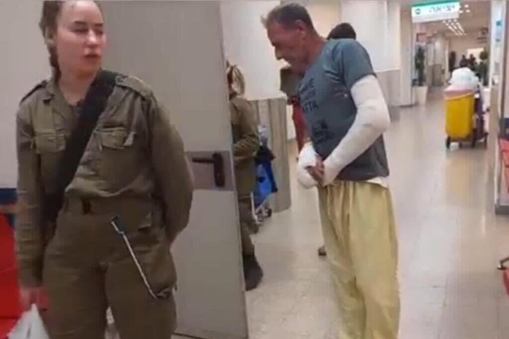 Screengrab of a video showing Hafez Huraini under Israeli detention inside Soroka hospital with two broken arms following a settler attack. (Photo: Muhammad Huraini)