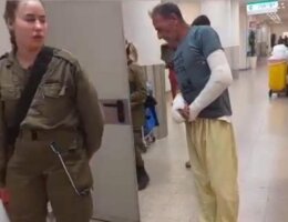 Screengrab of a video showing Hafez Huraini under Israeli detention inside Soroka hospital with two broken arms following a settler attack. (Photo: Muhammad Huraini)