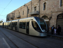 Passengers wait for a light rail train in Jerusalem, on Aug. 29, 2011. (Photo: Issam Rimawi/APA Images)