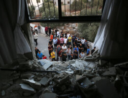 Palestinians inspect the damage to a home raided by Israeli forces raided in the village of Deir al-Hatab east of Nablus, in the West Bank, on October 5, 2022. A Palestinian was shot dead and at least two others injured by Israeli forces. (Photo: Shadi Jarar'ah/APA Images)