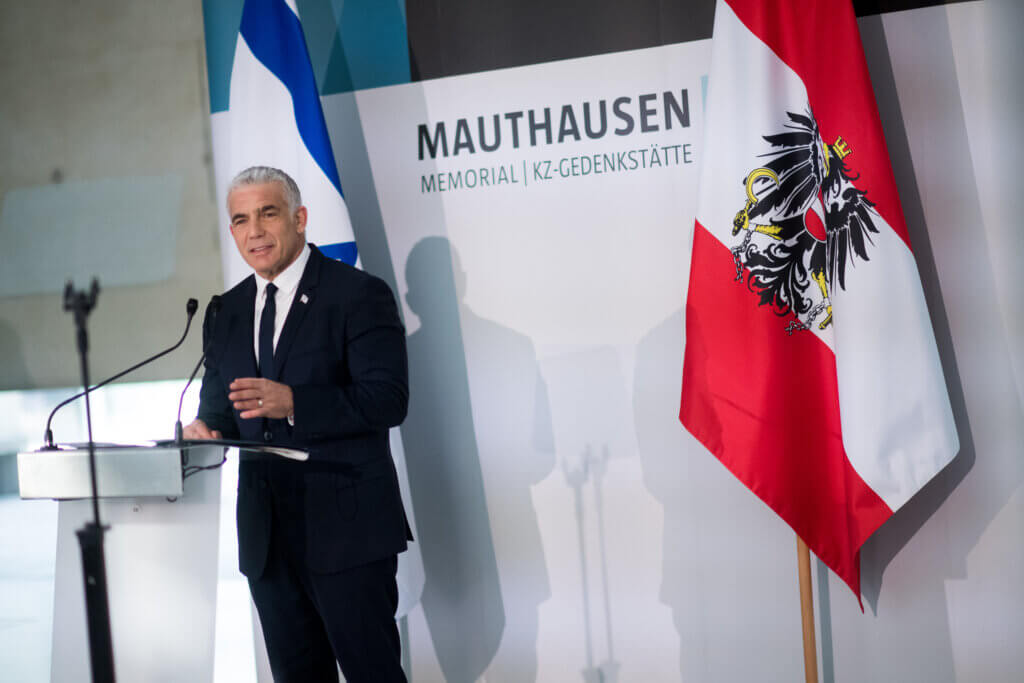 Yair Lapid attends a commemoration event on the occasion of International Holocaust Remembrance Day in Mauthausen, January 27, 2022.