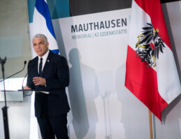 Yair Lapid attends a commemoration event on the occasion of International Holocaust Remembrance Day in Mauthausen, January 27, 2022.
