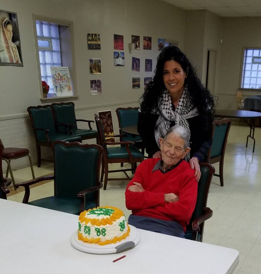 My sister, Leila, with a cake she made for Staughton’s 88th birthday party that was held at the Arab American Community Center in Youngstown, Ohio. (November 2017)
