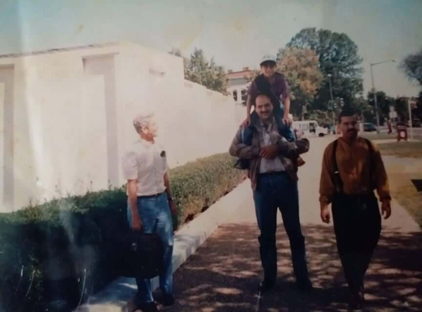 Staughton, amused by Muneer Najjar, from Jabaliya Refugee Camp, enjoying his ride on my shoulders after having surgery in the USA for a leg injury caused by an Israeli military shooting. (Kent, Ohio)