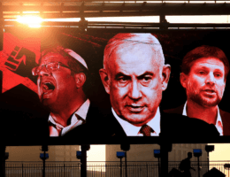 A campaign poster in Tel Aviv shows, from left, Itamar Ben-Gvir, Benjamin Netanyahu and Bezalel Smotrich. (Photo: Jamal Awad/Flash90)