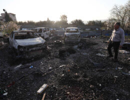 Palestinians inspect burned cars at a scrapyard in the town of Huwwara near Nablus, February 27, 2023, after a settler "pogrom" the next before. (Photo: Shadi Jarar'ah/APA Images)
