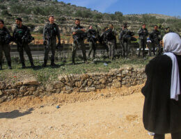 Israeli security forces block activists protesting at the entrance of Huwara in the West Bank, on March 3, 2023, following deadly violence by Israeli settlers. (Photo: Mohammed Nasser/ APA Images)
