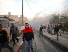Palestinians confront Israeli forces during a military raid on the Jenin refugee camp on March 7, 2023. (Photo: Shadi Jarar'ah/ APA Images)