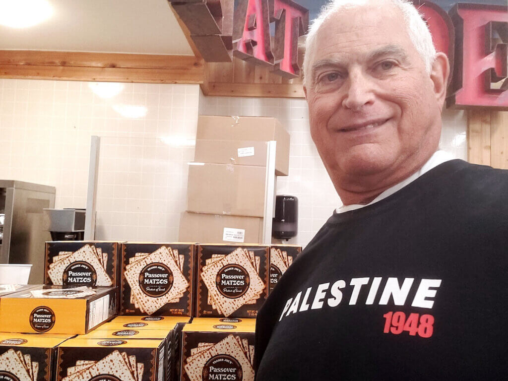 Seth Morrison's selfie in front of the Israeli Matzo display at Trader Joe's