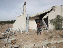Palestinians in Gaza inspect a destroyed chicken farm after Israel launched air strikes on the Palestinian enclave, April 8, 2023. (Photo: Youssef Abu Watfa/APA Images)