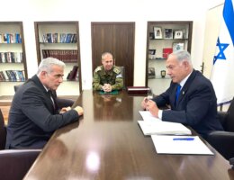 Yair Lapid meets with Benjamin Netanyahu at Israeli military HQ in Tel Aviv on April 9, 2023. (Photo: Israeli Government Press Office)