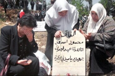 Photo of the author's late grandmother, Fatima Asad, taken at the 50th commemoration of the massacre in Deir Yassin. This was from the author's first visit to Deir Yassin in 1998. (Photo courtesy of Dina Elmuti)