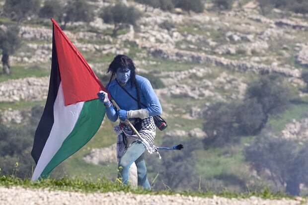 Opponents of the barrier scored a long-awaited victory on Thursday when the government began rerouting the enclosure to eat up less of a Palestinian village that has become a symbol of anti-wall protests and the site of frequent clashes (Photo: AFP/GETTY)