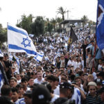 Israelis take part in the flag march marking Jerusalem Day on May 18, 2023. (Photo: Ilia Yefimovich/dpa via ZUMA Press/APAimages)