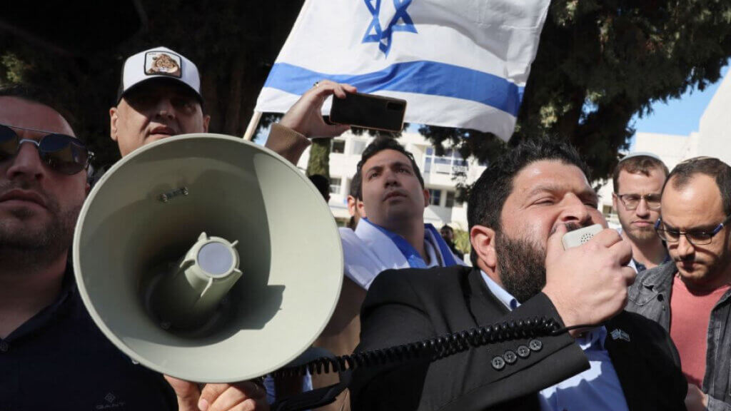 Almog Cohen, right, addresses a rally of the the far-right Otzma Yehudit party in Israel (Photo: Jack Guez/AFP via Getty Images)