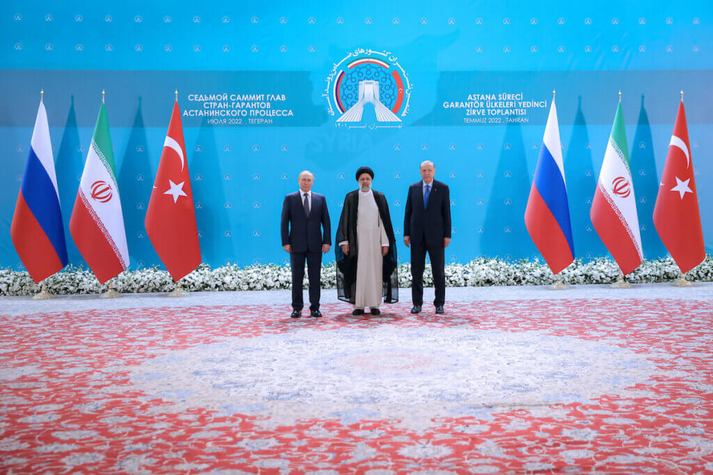 Iran's President EBRAHIM RAISI (center), Russian President VLADIMIR PUTIN (left), and Turkish President RECEP TAYYIP ERDOGAN (right) during a trilateral summit in Tehran, Iran