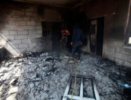 Palestinians inspect a house set on fire by Israeli settlers in the Palestinian village of Turmus Aya, near Ramallah, June 21, 2023. The photo portrays the charred remains inside one of the rooms in a house that was the target of the attack.