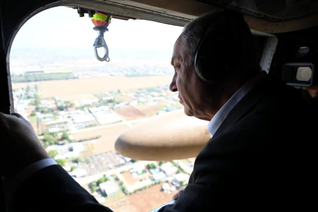 Israeli Prime Minister Benjamin Netanyahu surveys the outskirts of Jenin from the air on July 4, 2023 during Israel's biggest military operation in years in the occupied West Bank. (Photo: Israeli Prime Minister Office via APA Images)