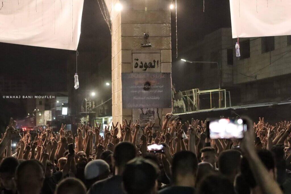 Palestinians cheer following the Israeli withdrawal from Jenin. (Photo: Wahaj Bani Moufleh via social media)