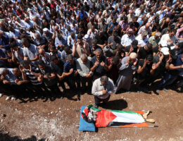 Palestinian mourners gather beside the body of Abdul Rahim Fayez Ghannam, 36, killed in an Israeli raid, during his funeral in the village of Aqaba, near the city of Tubas, in the northeastern West Bank, September 1, 2023. (Photo: © Alaa Badarneh/EFE via ZUMA Press\ APA images)