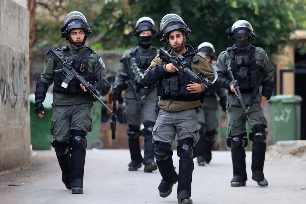 Israeli soldiers in the West Bank village of Kafr Dan in Jenin, on January 2, 2023, during an operation to demolish the homes of two Palestinians. (Photo: Ahmed Ibrahim/APA Images)