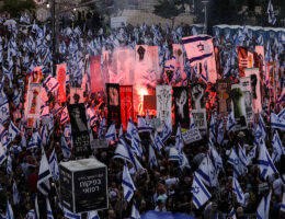 Israelis protest outside the Supreme Court in Jerusalem against the Israeli Prime Minister Benjamin Netanyahu's government plan to overhaul the judicial system, September 11, 2023. Photo shows a sea of protestors carrying Israeli flags.