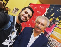 Abdelrahman ElGendy (left) with Ibrahim Nasrallah (right) taking a selfie at the Palestine Writes Literature Festival, September 2023.