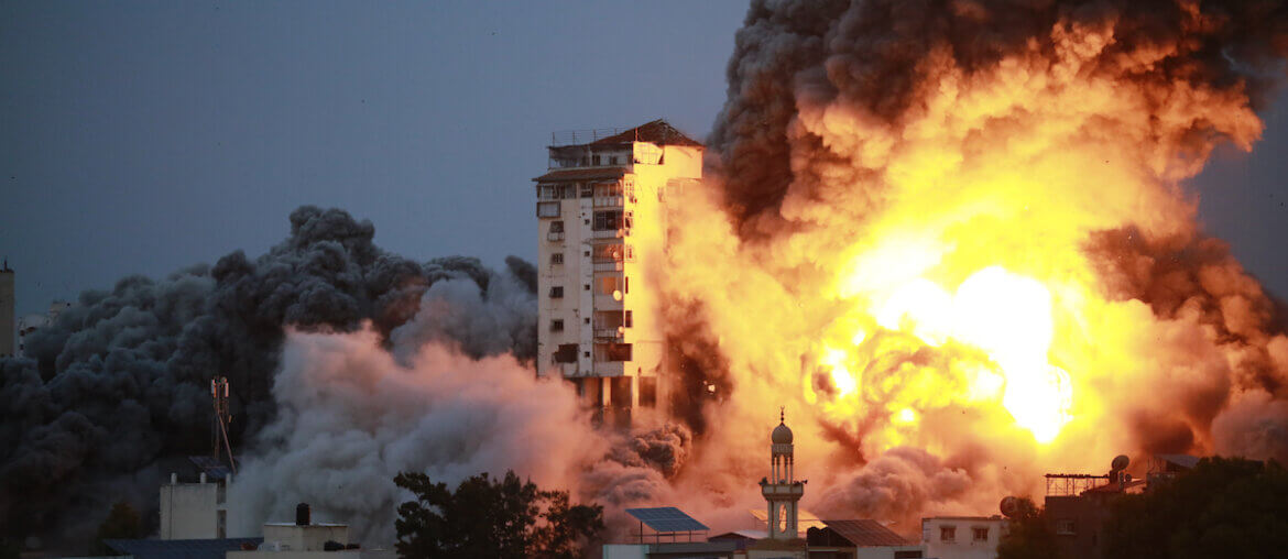 Smoke and flames billow after Israeli forces struck a high-rise tower in Gaza City, October 7, 2023. (Photo: APA Images)
