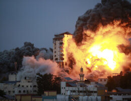 Smoke and flames billow after Israeli forces struck a high-rise tower in Gaza City, October 7, 2023. (Photo: APA Images)
