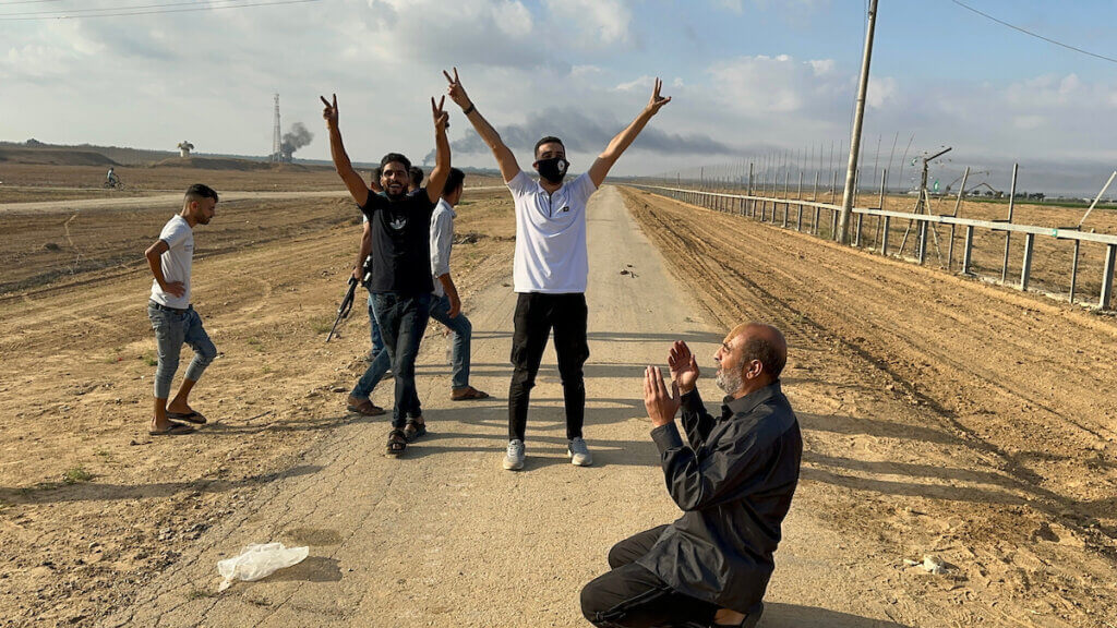 Palestinians after crossing the border fence with Israel from Khan Yunis in the southern Gaza Strip on October 7, 2023. (Photo: Stringer/APA Images)