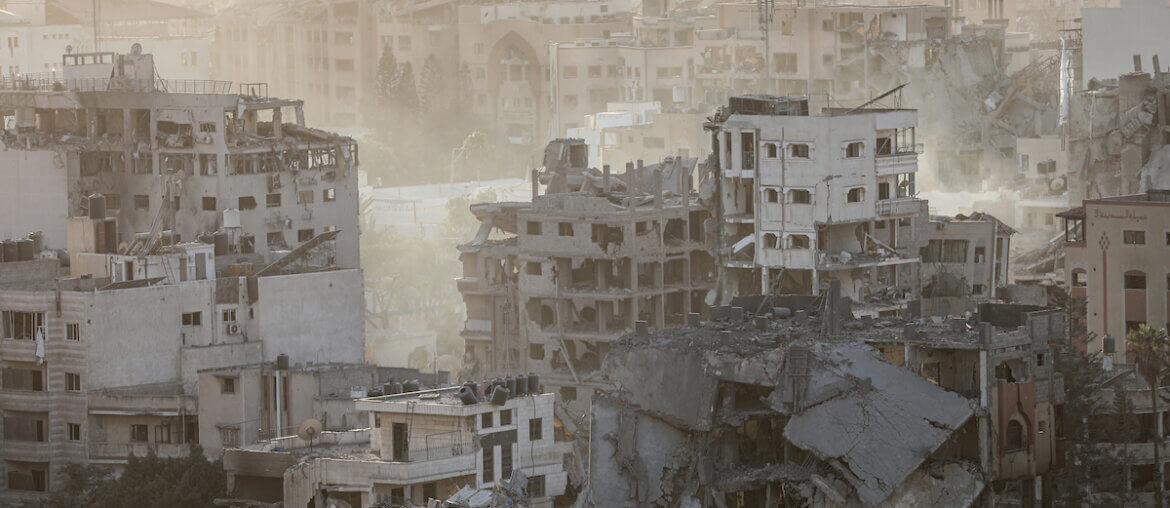 A view of ruins and demolished buildings following Israeli air strikes on the Al-Rimal neighborhood in the Gaza Strip on October 12, 2023.