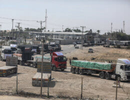Trucks loaded with aid arrive from the Egyptian side to the Palestinian side at the Rafah border crossing, October 21, 2023