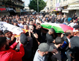 People attend the funeral of two Palestinians killed during an Israeli airstrike on Jenin refugee Camp in Jenin, October 22, 2023.