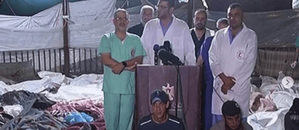 Doctors at Gaza City's Al Ahli Baptist Hospital hold a press conference surrounded by the bodies of some of those killed in the massacre, October 17, 2023. (Photo: Screenshot)