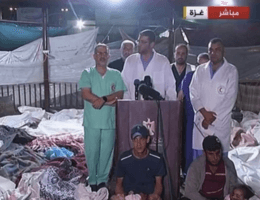 Doctors at Gaza City's Al Ahli Baptist Hospital hold a press conference surrounded by the bodies of some of those killed in the massacre, October 17, 2023. (Photo: Screenshot)