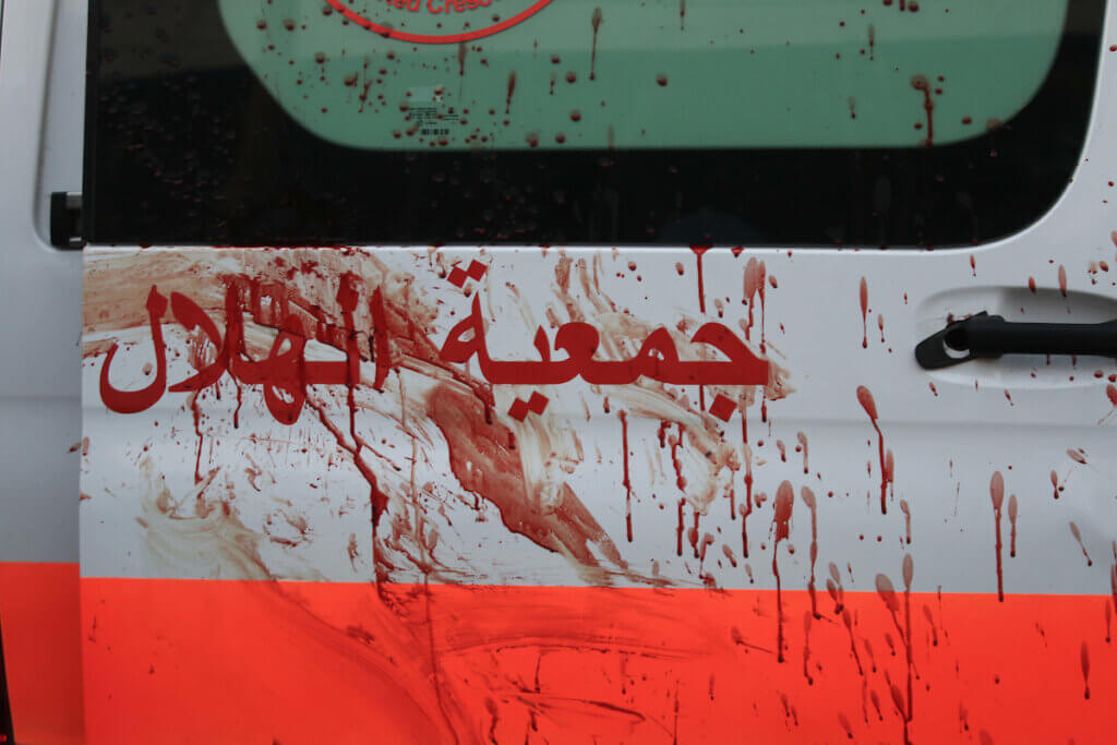 Blood stains on an ambulance of the Palestinian Red Crescent, following an Israeli airstrike at the entrance of Al-Shifa Hospital in Gaza City, November 3, 2023.