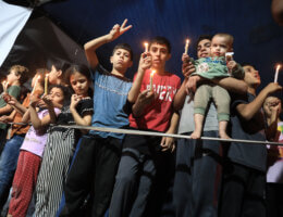 Palestinian children hold a candlelight vigil at Al-Shifa' Hospital in Gaza City, November 03, 2023.