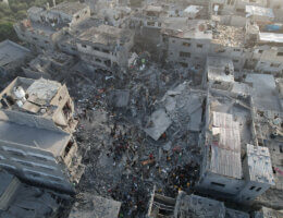 An aerial view of locals conducting search and rescue operations in the rubble of collapsed buildings during the 30th day of Israeli airstrikes, which killed 51 Palestinians in Al-Maghazi refugee camp in Deir Al-Balah, November 05, 2023.