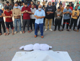 Palestinians pray during the funeral of their relatives, who were killed after an Israeli airstrike on the city of Deir al-Balah, Al-Aqsa Hospital, November 10, 2023.
