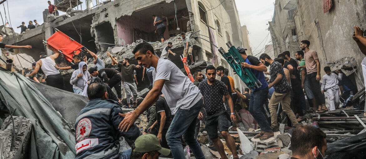 First responders and volunteers search the destroyed house of the Al-Ghouti family following an Israeli airstrike, Rafah, November 11, 2023.