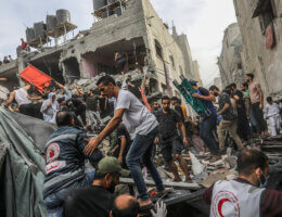 First responders and volunteers search the destroyed house of the Al-Ghouti family following an Israeli airstrike, Rafah, November 11, 2023.
