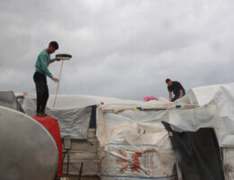 Displaced Palestinians prepare tents near Shuhada Al-Aqsa hospital in Deir el-Balah, central Gaza, after rainfall in Gaza, November 14, 2023. (Photo: Naaman Omar/APA Images)