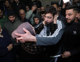 Palestinian prisoner Khalil Zama' hugs a relative after being released from an Israeli jail in exchange for Israeli captives released by Hamas from the Gaza Strip, at his home in Halhul village near Hebron in the occupied West Bank on November 27, 2023. (Photo: Mamoun Wazwaz/APA Images)