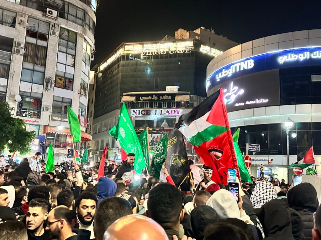Crowds of Palestinians carrying the freed Palestinian child prisoners on Sunday, celebrating the bittersweet victory.