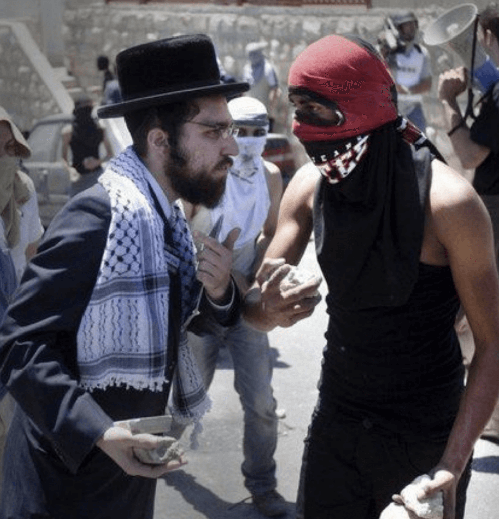 An orthodox Jew and a Palestinian getting ready to throw stones at Israeli police.