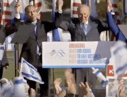 Sen. Chuck Schumer (D-NY), Rep. Hakeem Jeffries (D-NY), Rep. Mike Johnson (R-LA), and Sen. Joni Ernst (R-IA) join hands at Israel rally. (March for Israel stream)