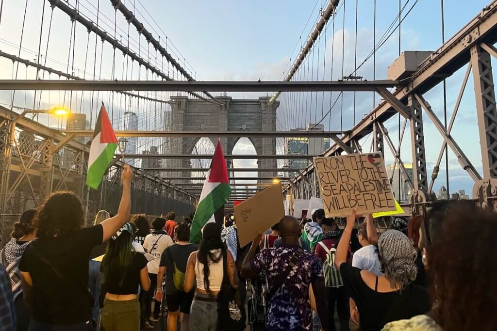 Palestine solidarity protest marching over the Brooklyn Bridge on October 28, 2023.