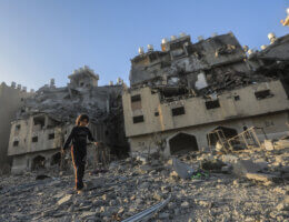 A resident of the Qatari-funded Hamad Town residential complex in Khan Younis in the southern Gaza Strip searches for belongings as they flee their homes after an Israeli raid completely destroyed more than six residential towers, December 2, 2023. (Photo: © Mohammed Talatene/dpa via ZUMA Press APAimages)